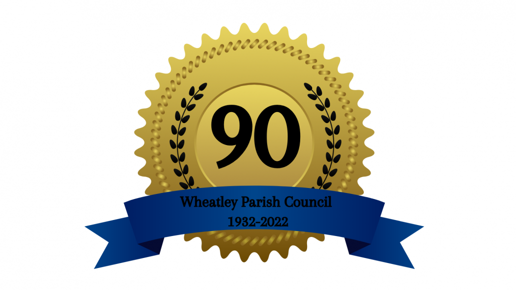 gold rosette celebrating 90 years of the parish council